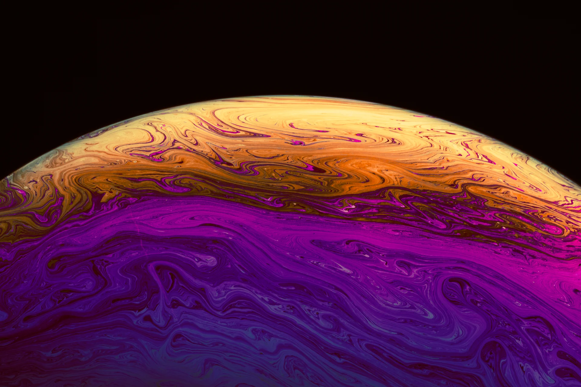 Abstract Colorful Vibrant Rippled Soap Bubble Black Background. Dark wallpaper. 4860×3240px. Free download for personal use.