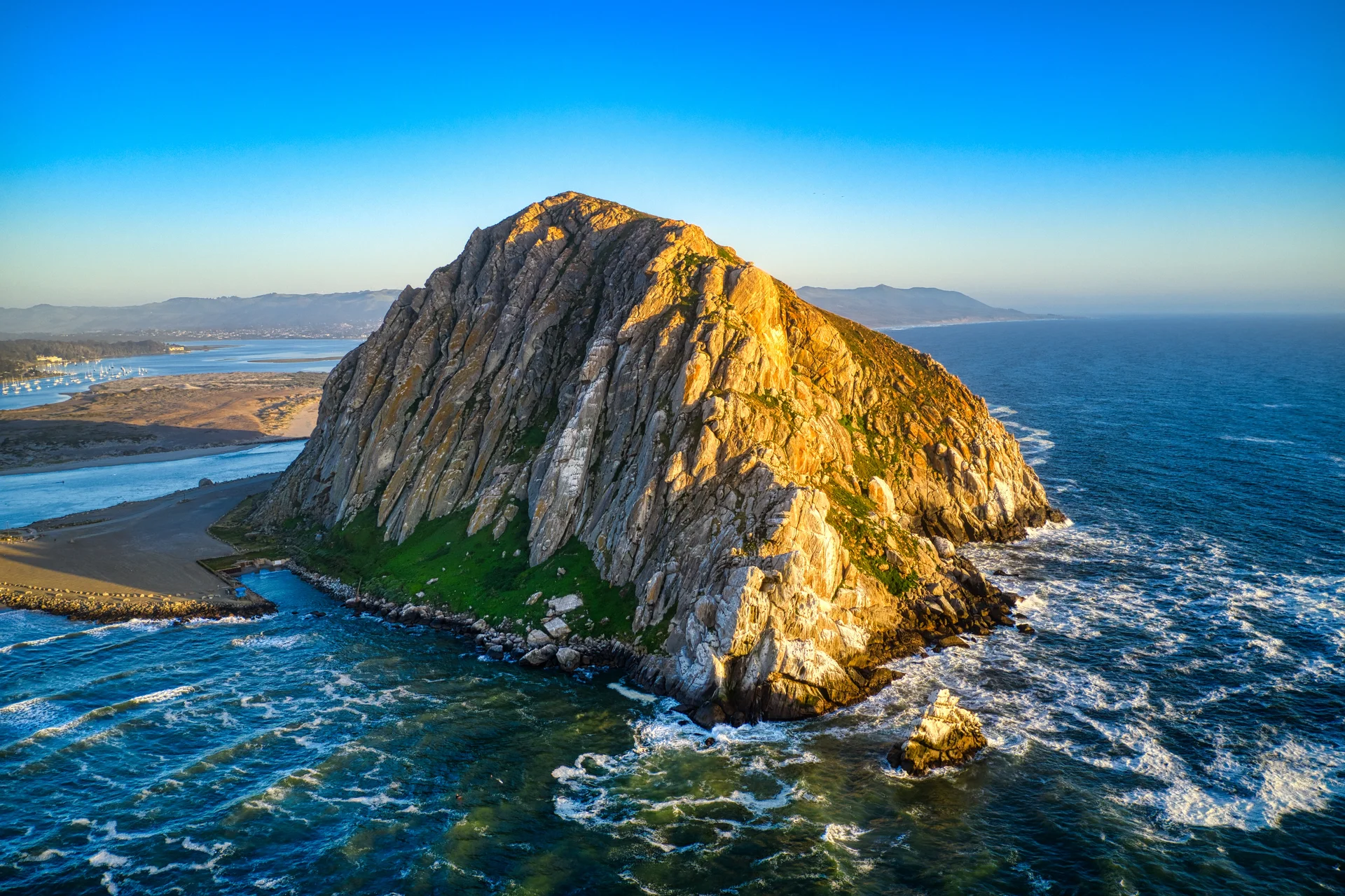 Aerial Shot Morro Rock California Midday. Aerial wallpaper. 5456×3635px. Free download for personal use.