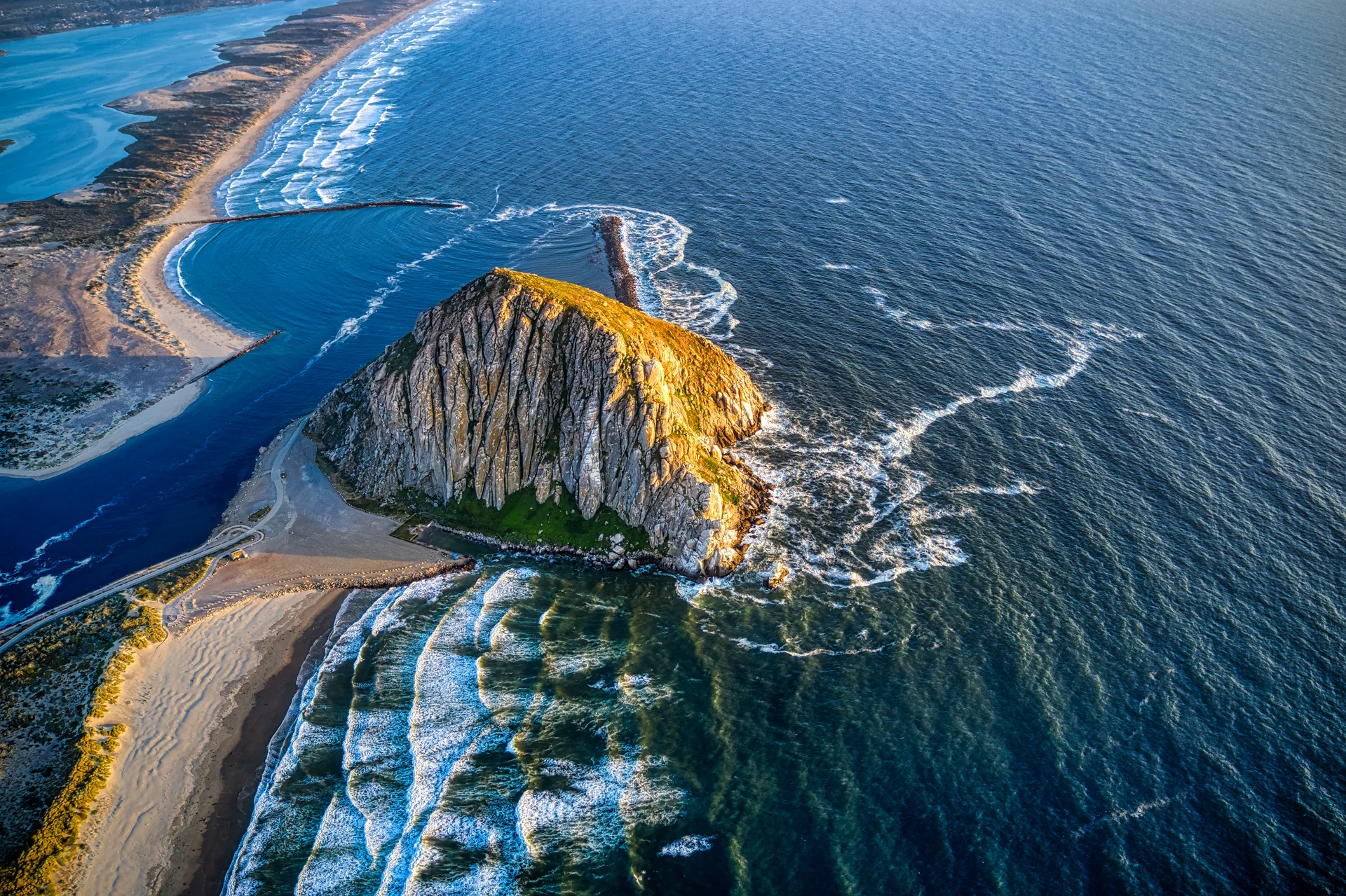 Aerial Shot Morro Rock California Sunset. Nature wallpaper. 5459×3637px. Free download for personal use.