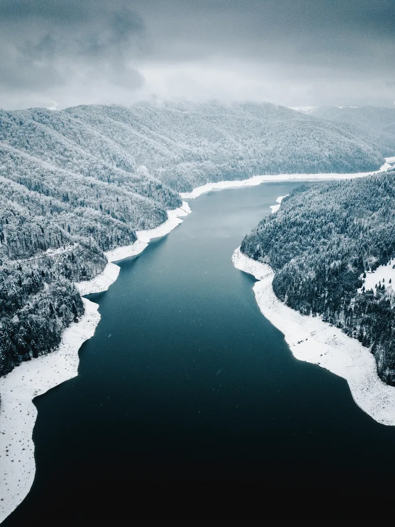 Aerial View River Against Sky Winter