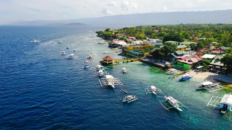 Aerial View Sandy Beach With Tourists Swimming Beautiful Clear Sea Water Sumilon Island Beach Landing Near Oslob Cebu Philippines Boost Up Color Processing