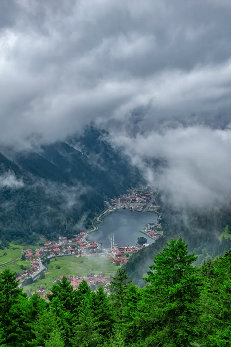 Aerial View Town Against Cloudy Sky