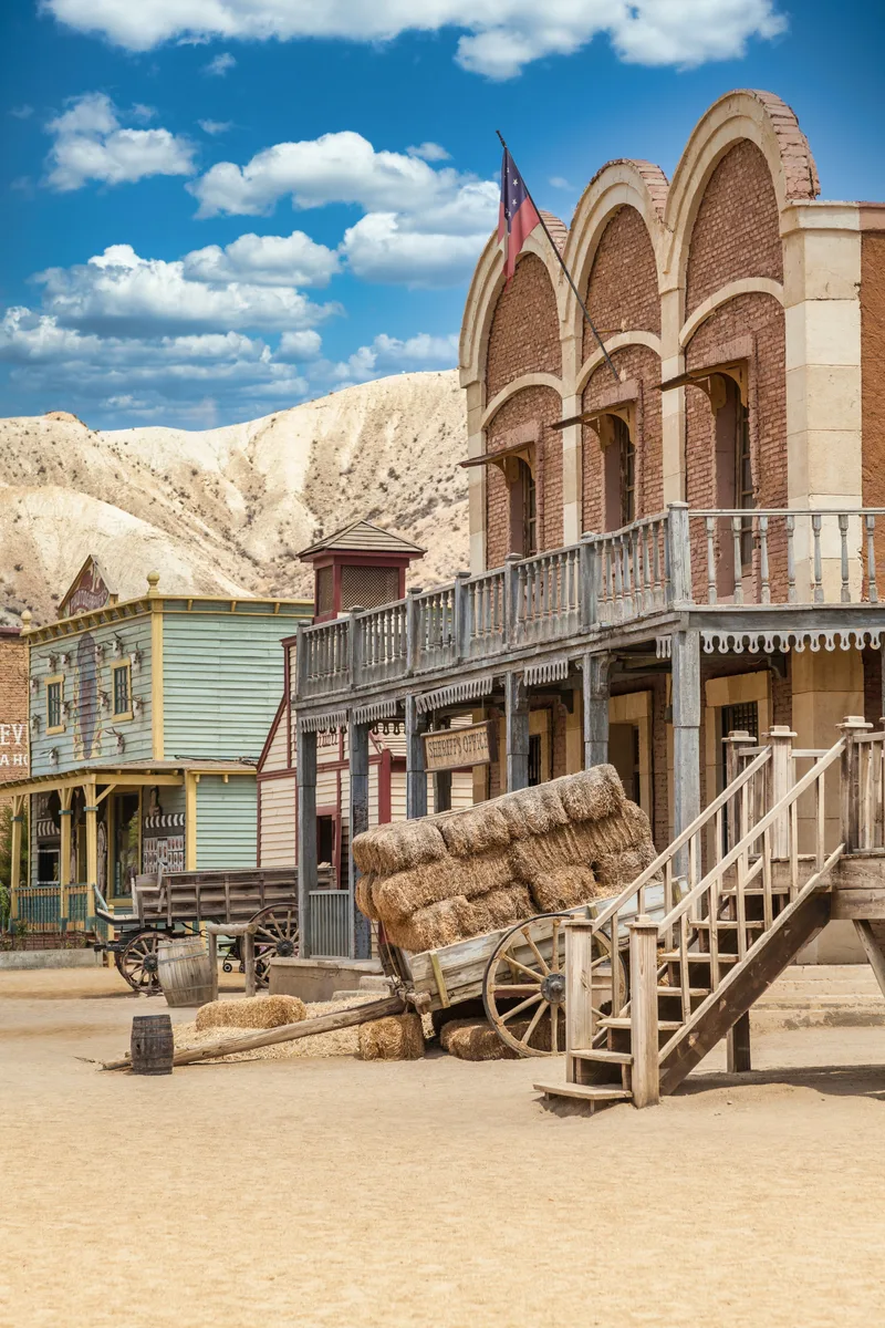 Almeria Spain Circa August 2020 Vintage Far West Town With Saloon Old Wooden Architecture Wild West With Blue Sky Background