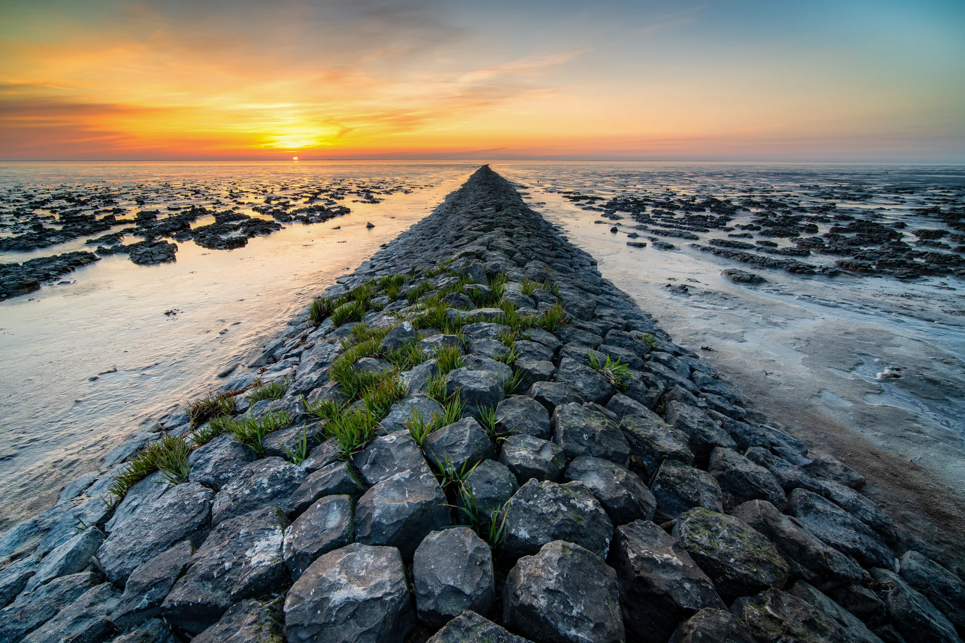 Amazing Shot Rocky Beach Sunset Distance. Nature wallpaper. 5956×3971px. Free download for personal use.