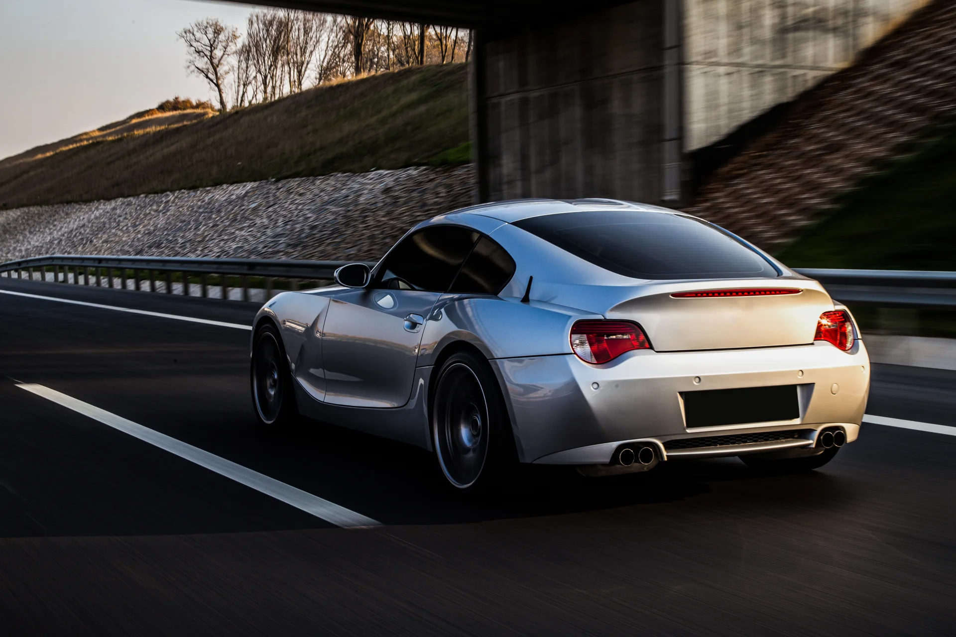 Back Side View Metallic Silver Coupe Road. Aerial wallpaper. 4997×3331px. Free download for personal use.