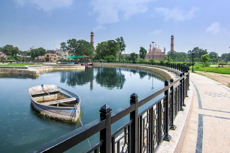 Badshahi Mosque View With Boat From Lake Outside Greater Iqbal Park