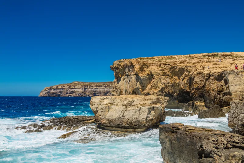Beautiful Scenery Rocky Cliff Near Sea Waves Beautiful Blue Sky