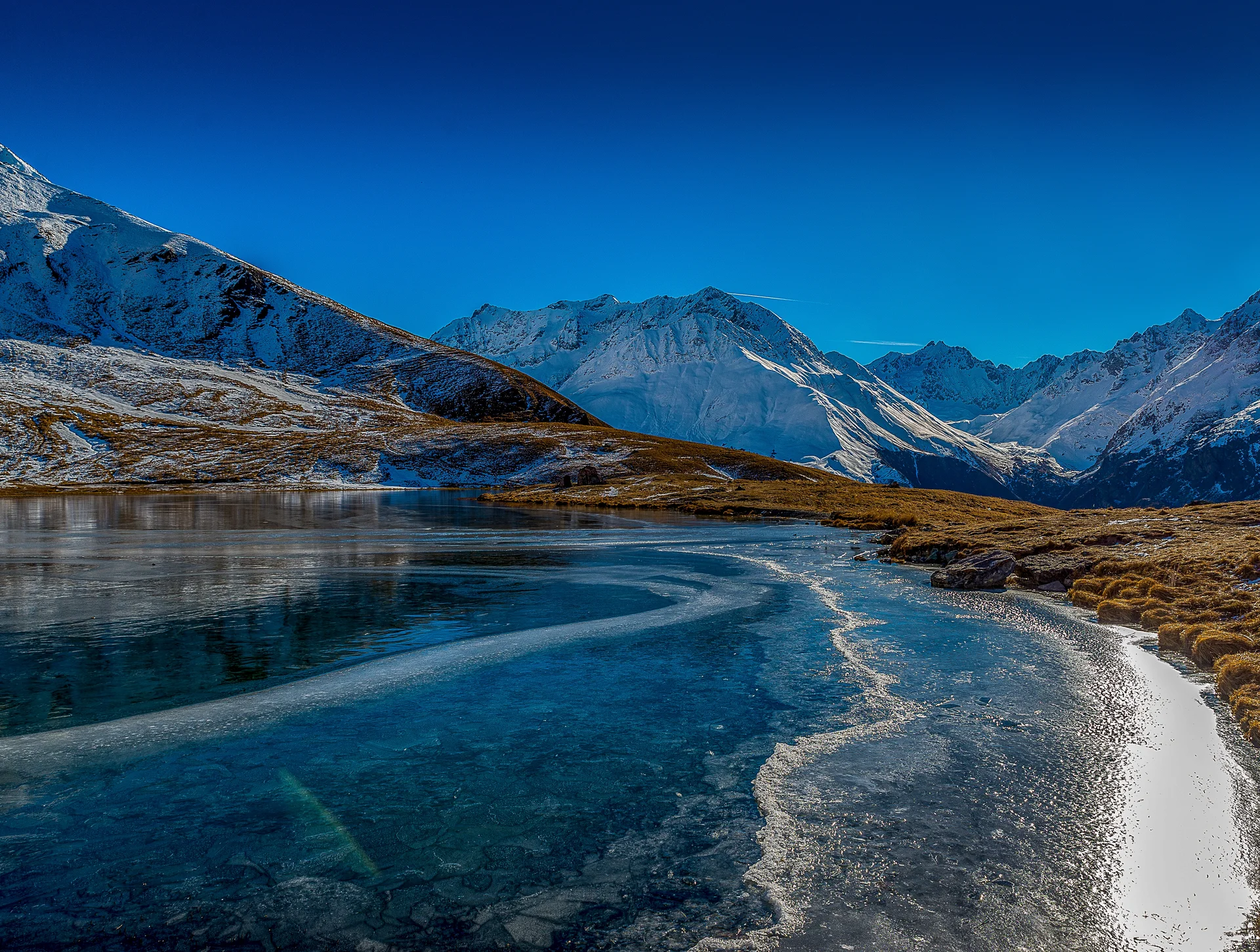 Beautiful Shot Frozen Lake Mountains. Nature wallpaper. 5091×3848px. Free download for personal use.