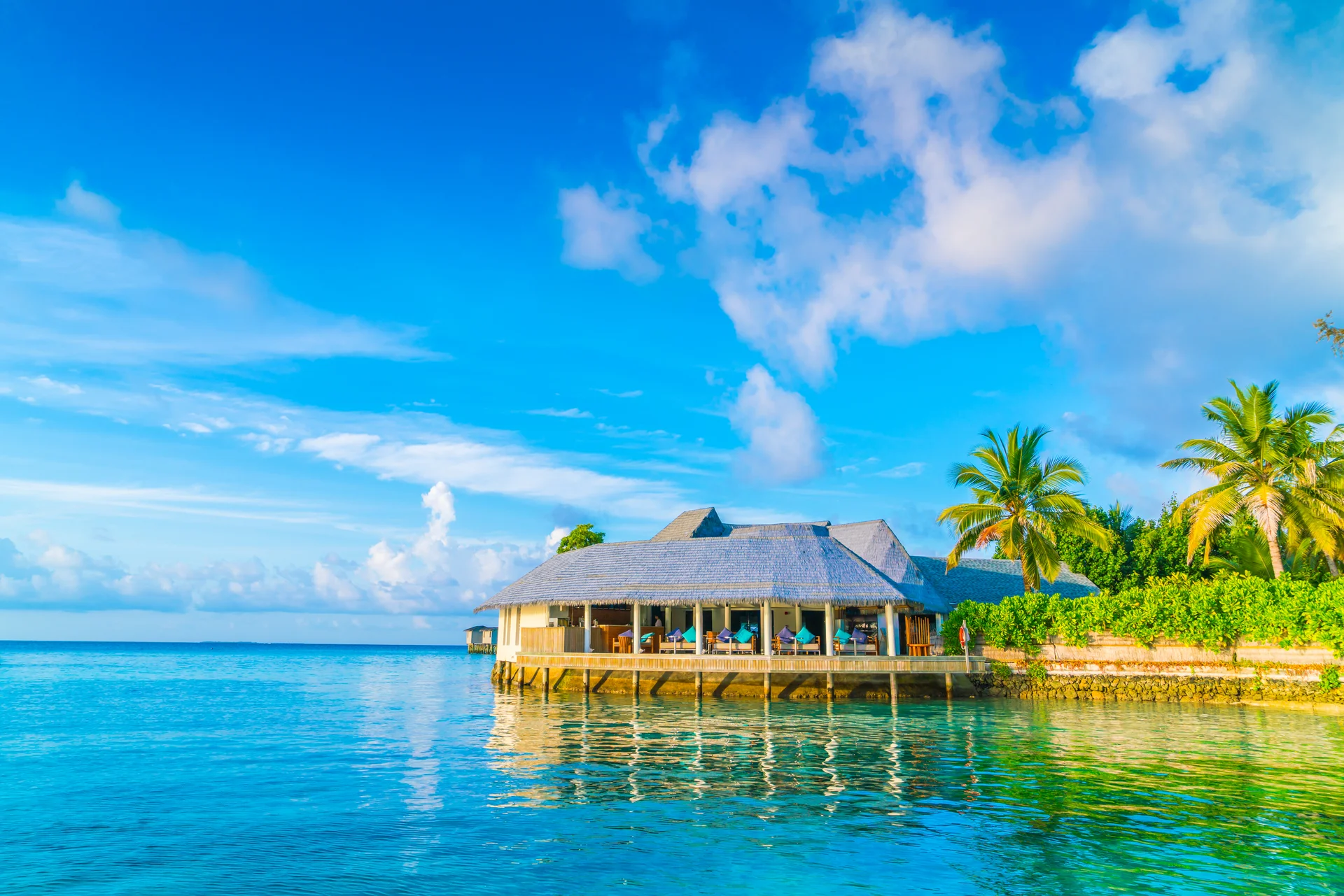 Beautiful Water Villas Tropical Maldives Island Sunrise Time. Nature wallpaper. 7952×5304px. Free download for personal use.