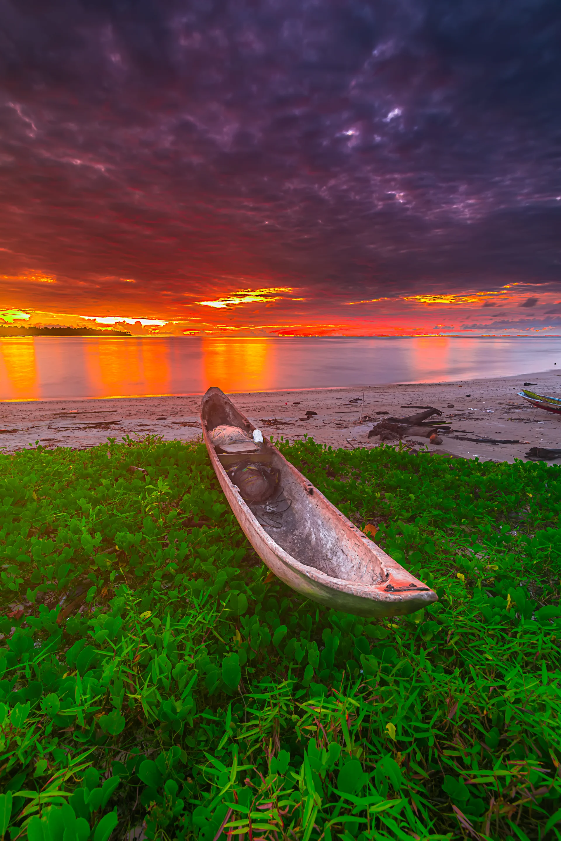 Boat Beach Sunset With Sun Setting It. Nature wallpaper. 4912×7360px. Free download for personal use.