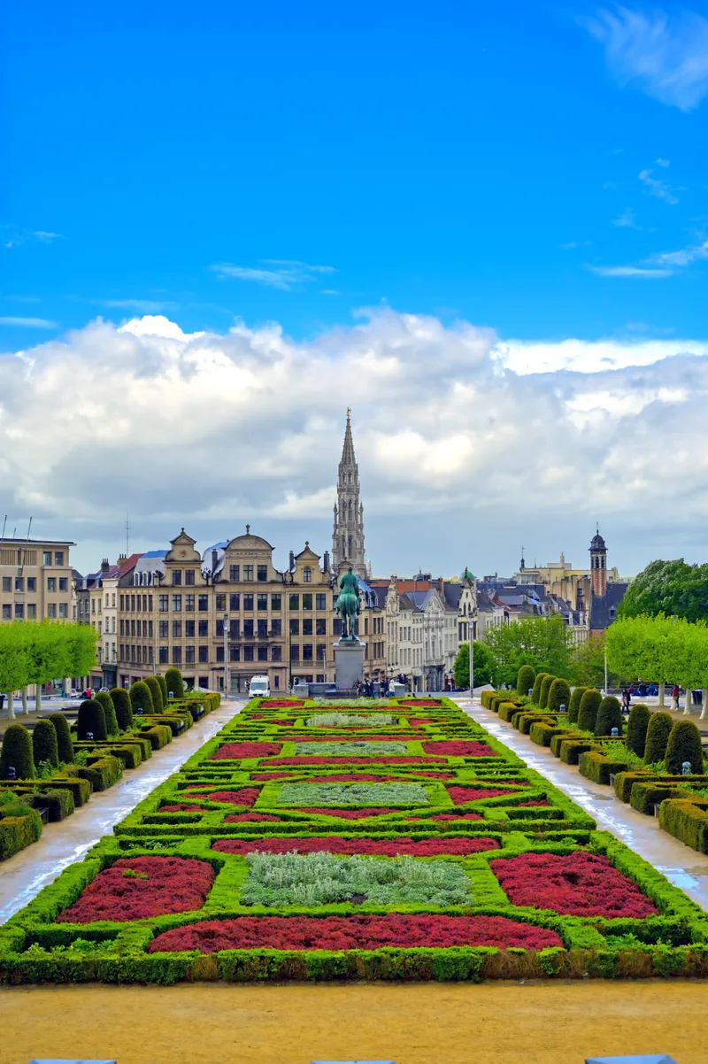 Buildings Garden Against Cloudy Sky