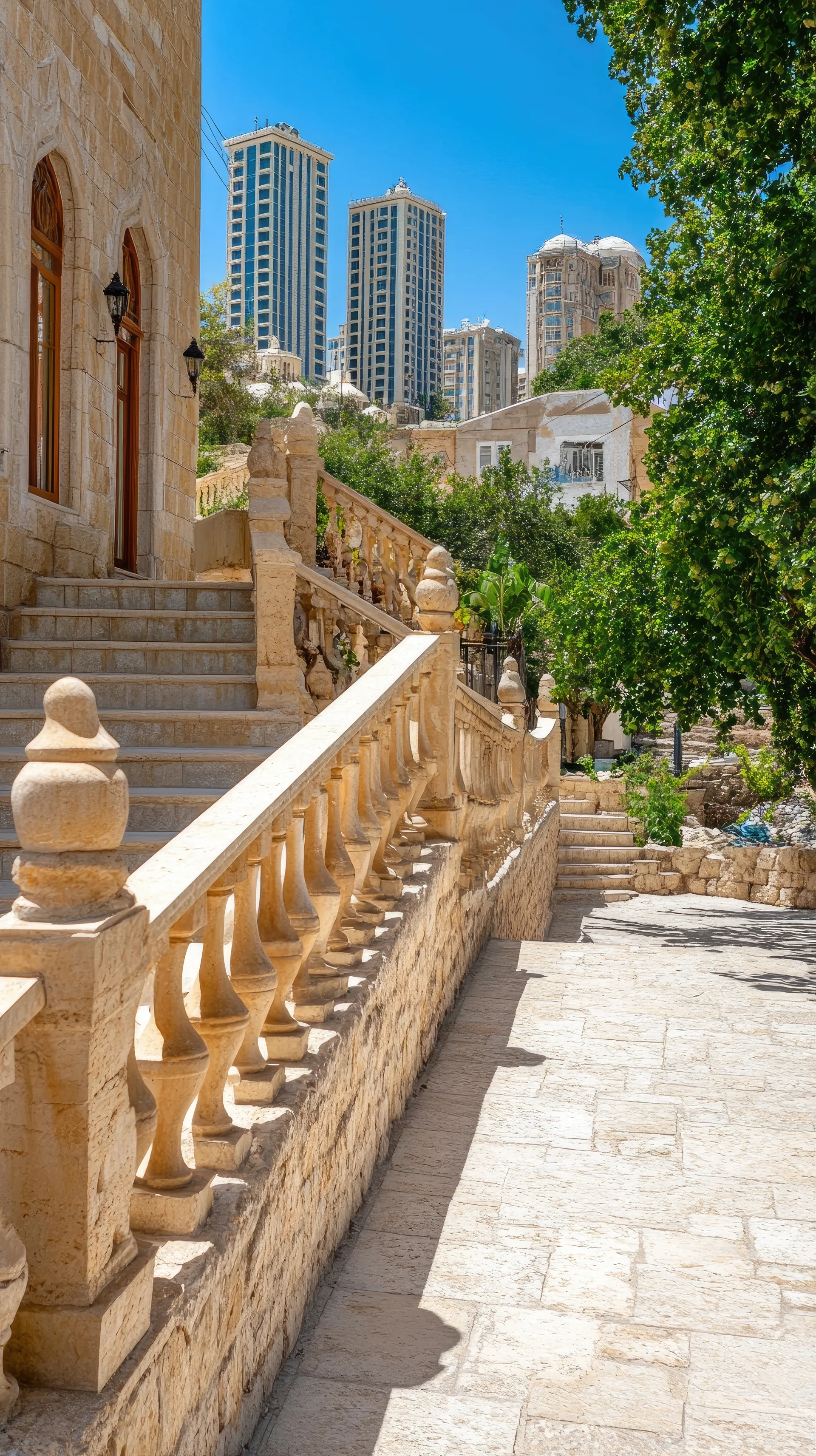 Charming Stone Balustrades Grace Historic Stairs Old Baku Building With Modern Skyscrapers Backdrop Bright Day. Vintage wa…
