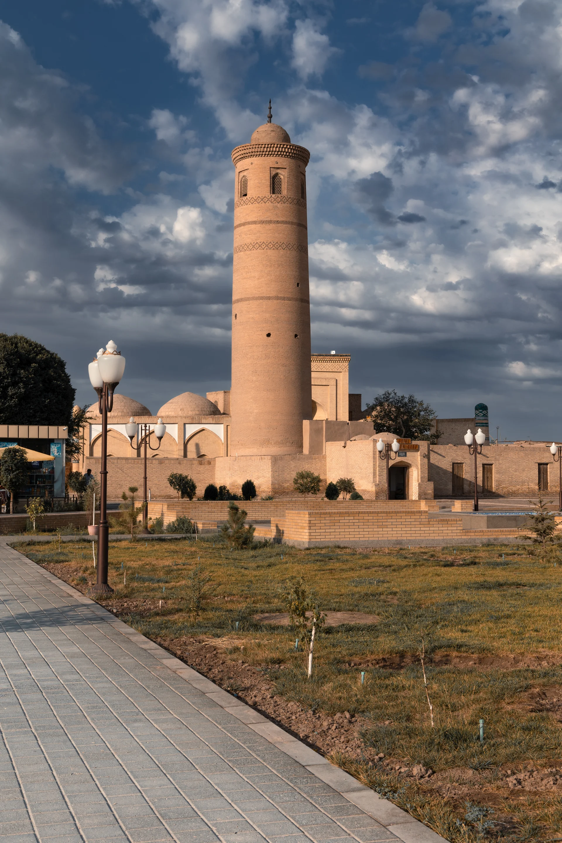 Cityscape With Ancient Palvan Kori Minaret Against Cloudy Sky Khiva Uzbekistan. Uncategorized wallpaper. 3648×5472px. Free…