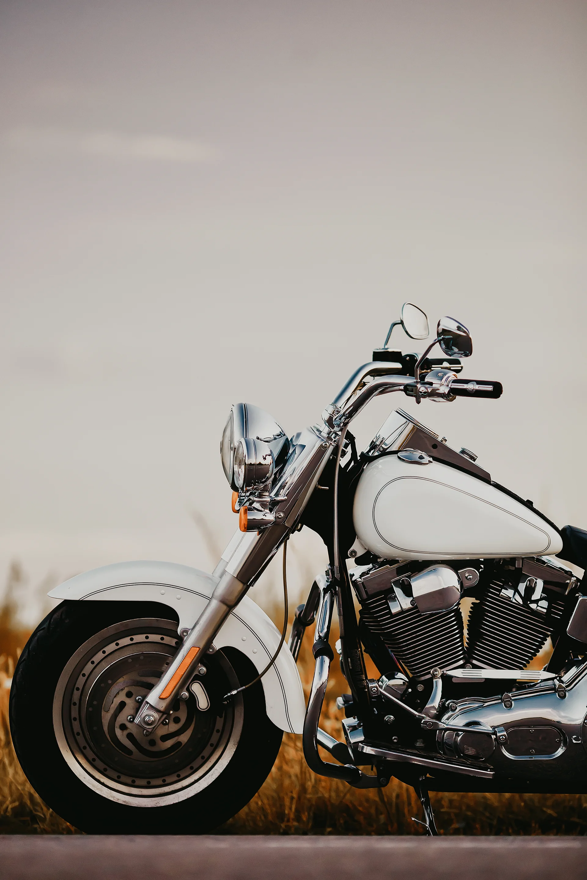 Custom White Roadster Retro Motorbike. Vintage wallpaper. 3483×5225px. Free download for personal use.