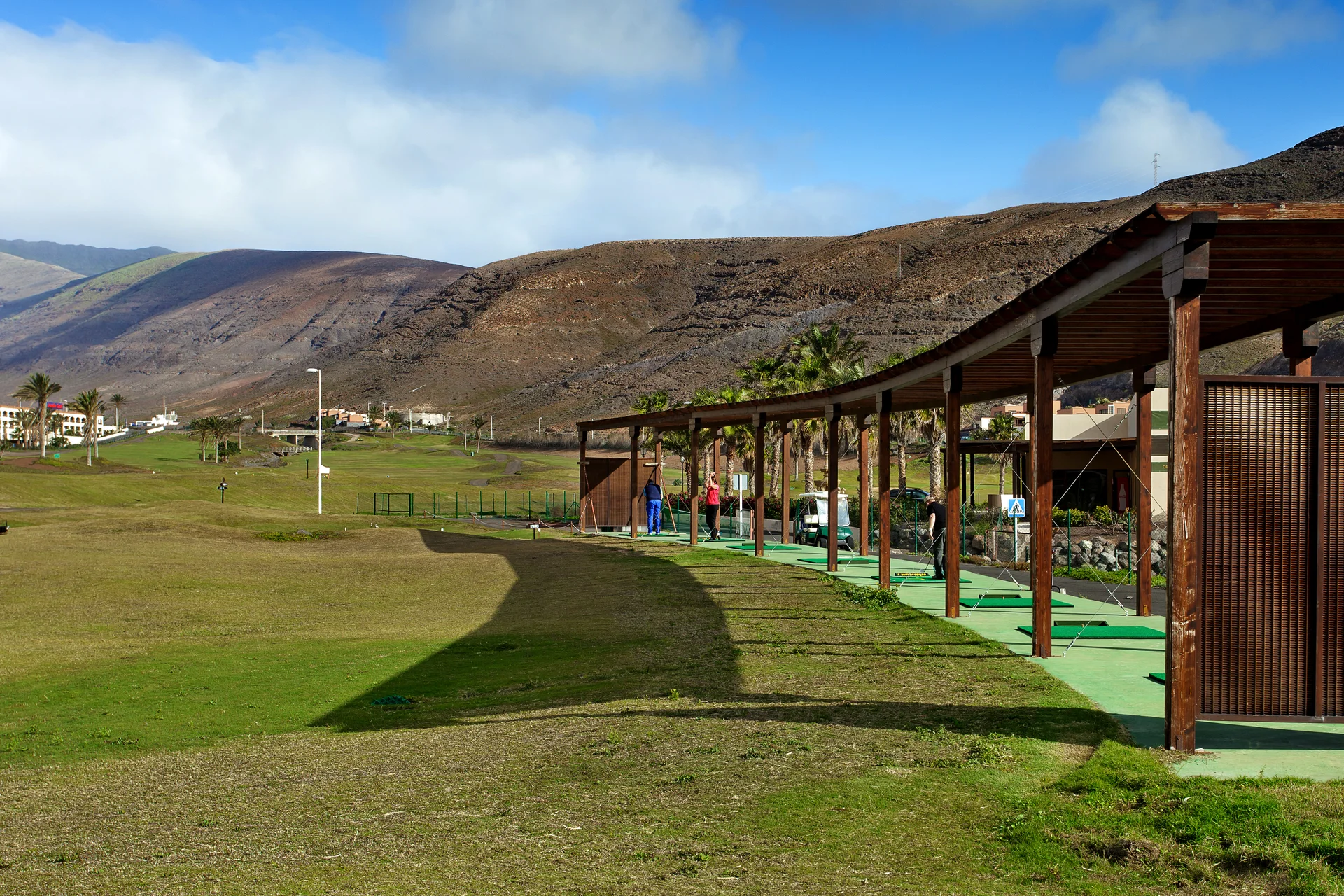 Detail Training Area Golf Practice Field With Mountains Background. Nature wallpaper. 4500×3000px. Free download for perso…