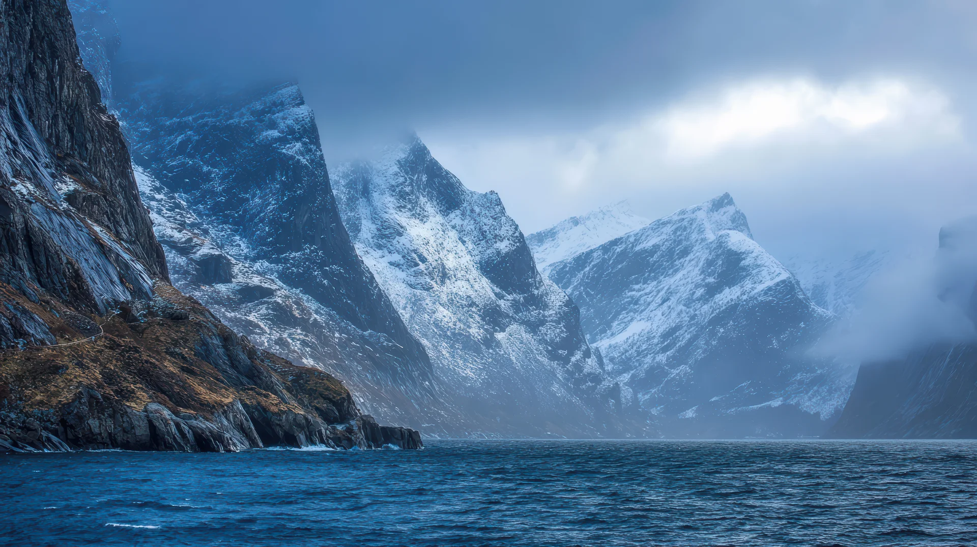Dramatic Fjord Landscape With Snow Capped Mountains. Nature wallpaper. 8736×4896px. Free download for personal use.