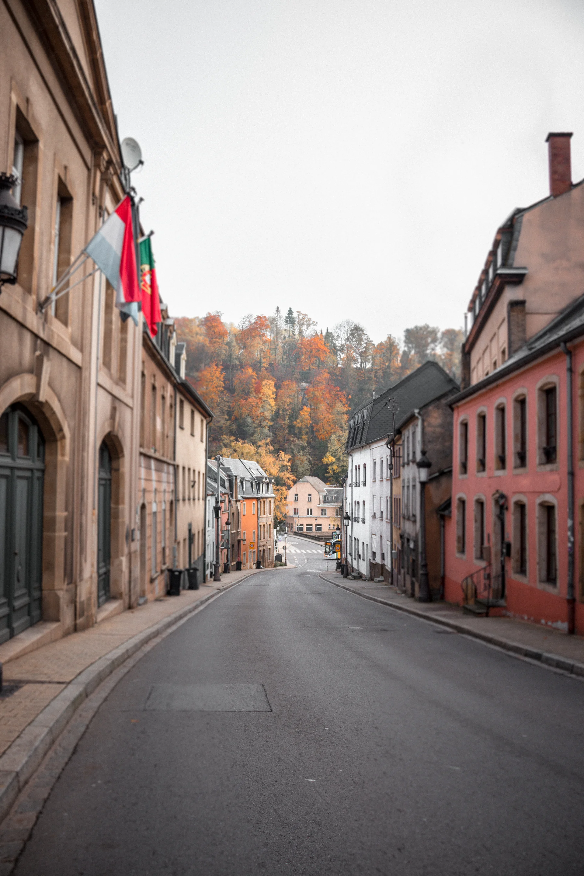 Empty Road Red Brown Concrete Buildings. Cities wallpaper. 4000×6000px. Free download for personal use.