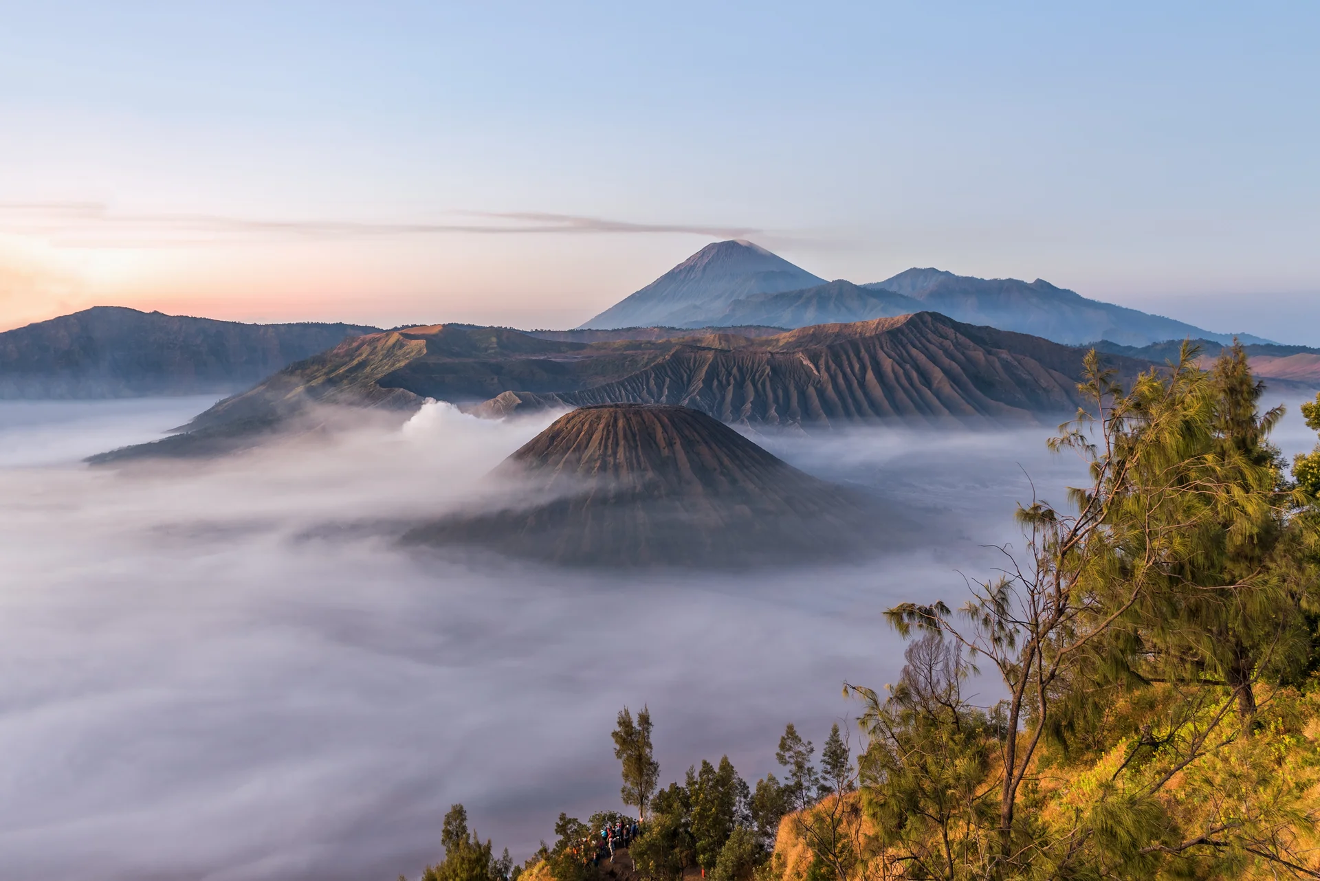 Fog Covered Bromo Mountain Valley Sunrise. Nature wallpaper. 3068×2048px. Free download for personal use.