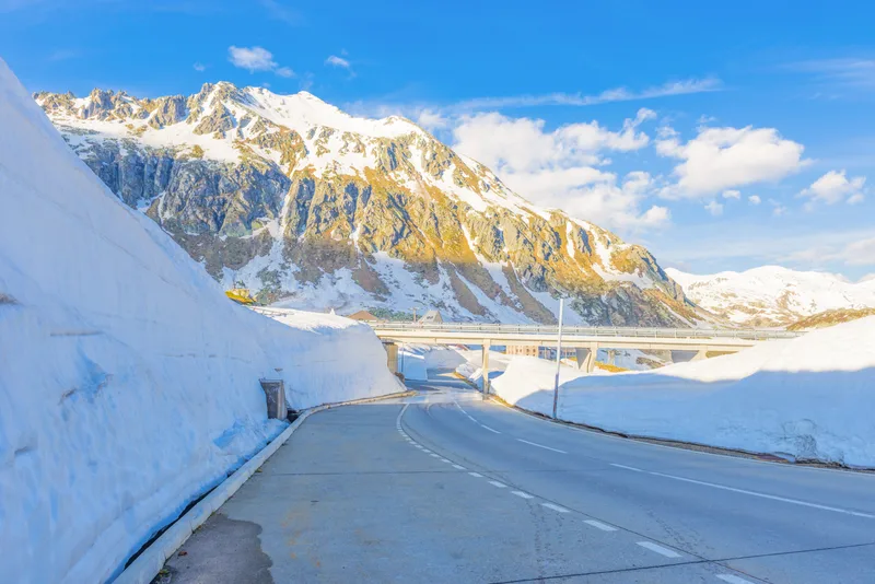 Gotthard Pass Surrounded By Mountains Covered Snow Sunlight Switzerland