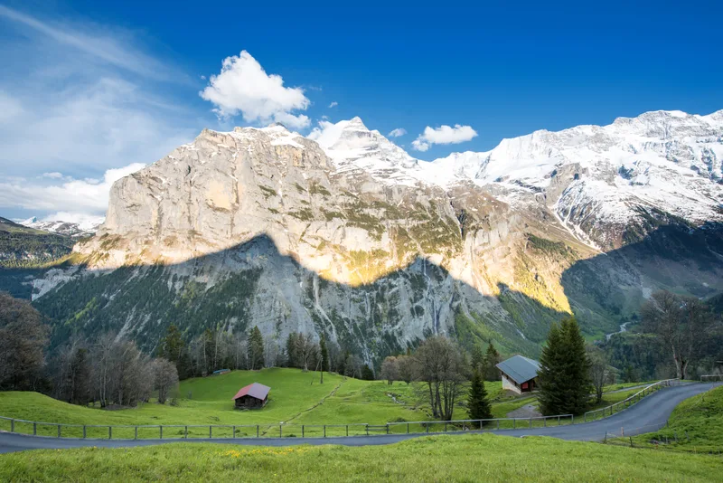Green Fields Famous Stunning Touristic Town With High Cliffs Lauterbrunnen Switzerland