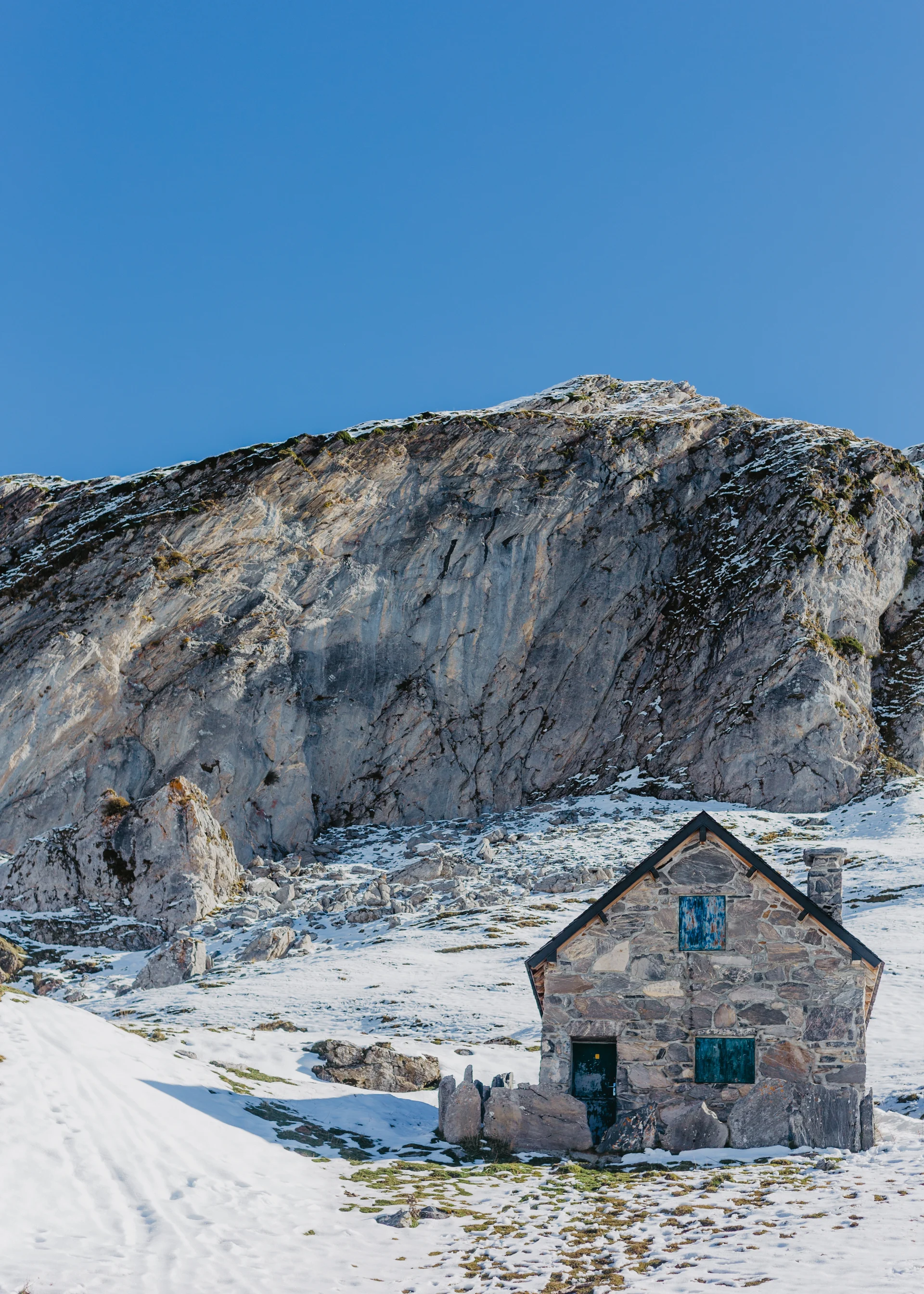 Handbuilt Grey Stone House With High Rocks Beautiful Clear Blue Sky Background. Nature wallpaper. 3571×5000px. Free downlo…