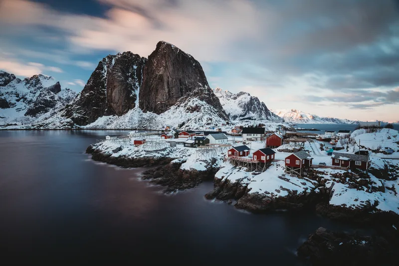 Horizontal Shot Shore Town With Red Houses Near Sea Snowy Mountain Back