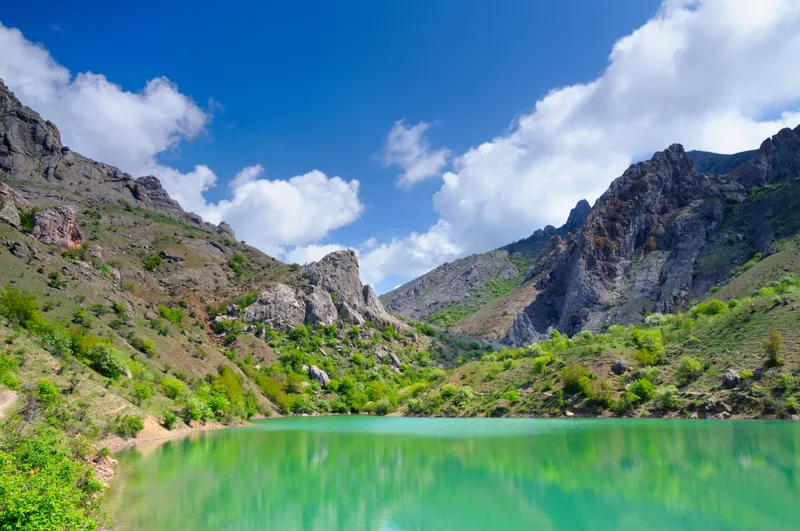 Lake With Azure Water Located Mountains