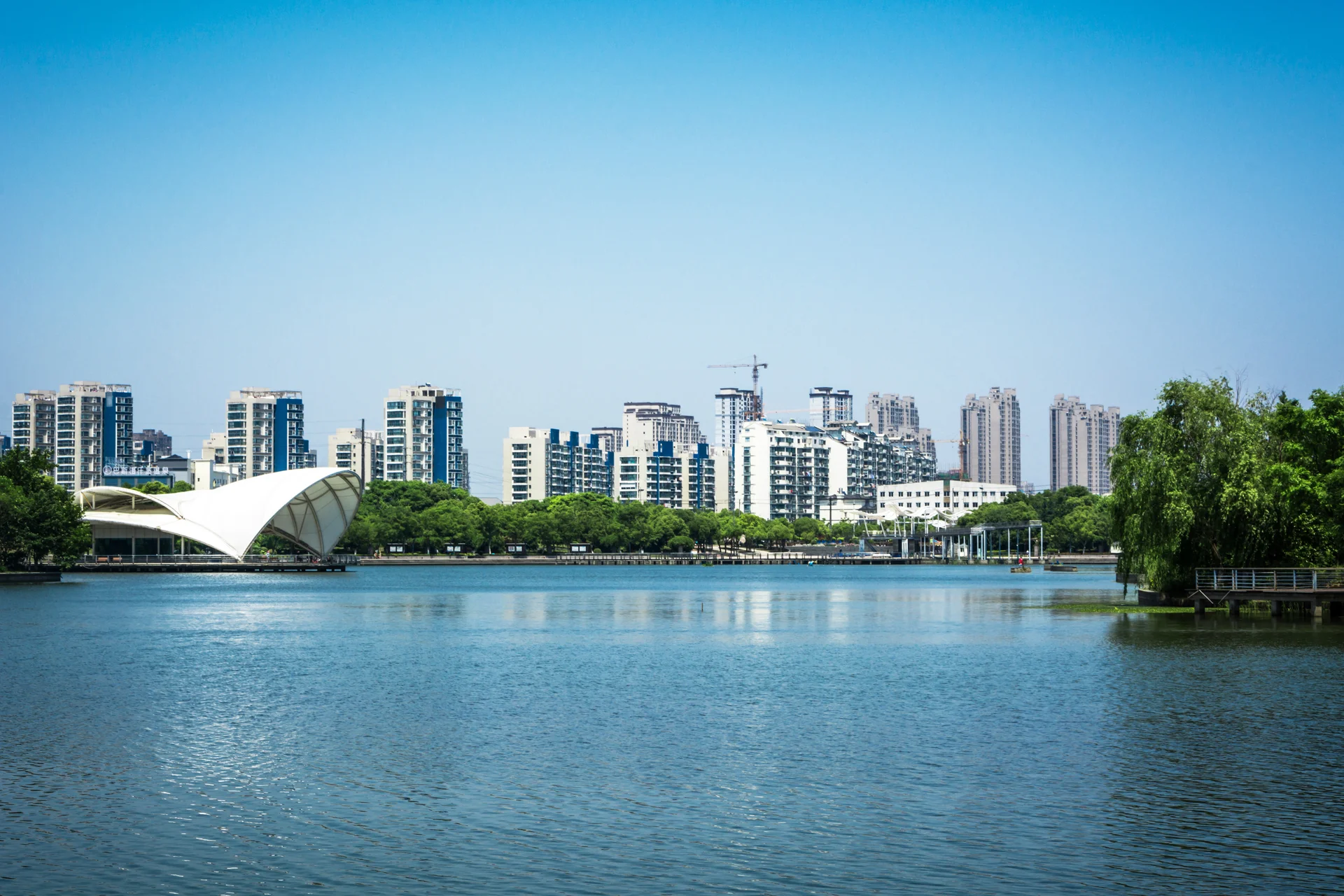 Lake With City. Uncategorized wallpaper. 5000×3333px. Free download for personal use.