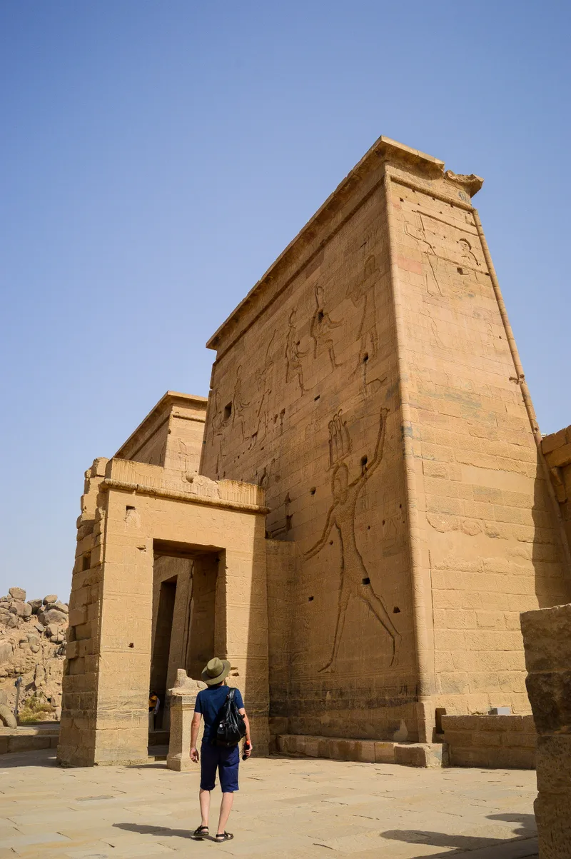 Low Angle Shot Male Standing Front Isis Aswan Temple Egypt