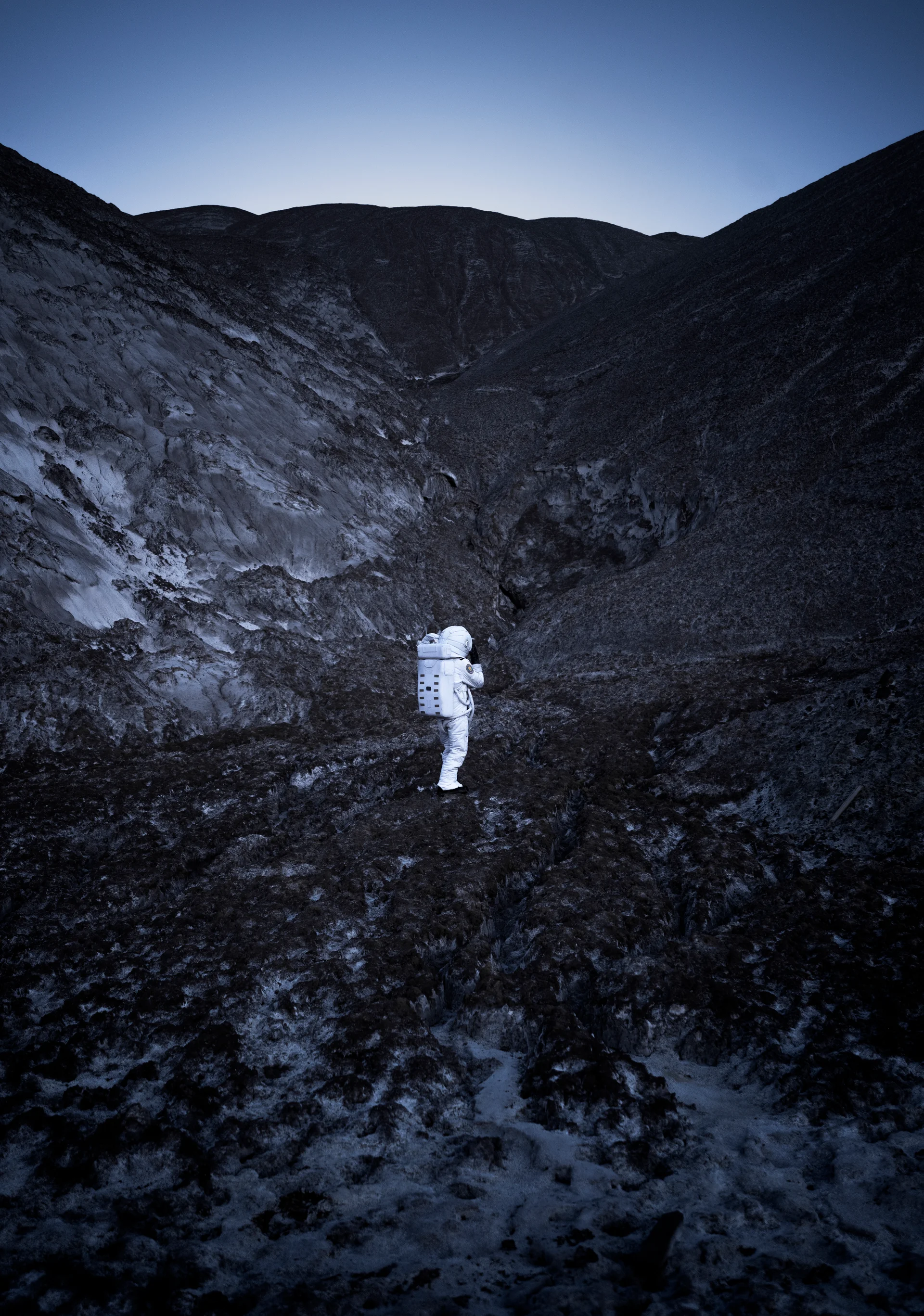 Male Astronaut Exploring Night Space Mission Unknown Planet. Space wallpaper. 4016×5720px. Free download for personal use.