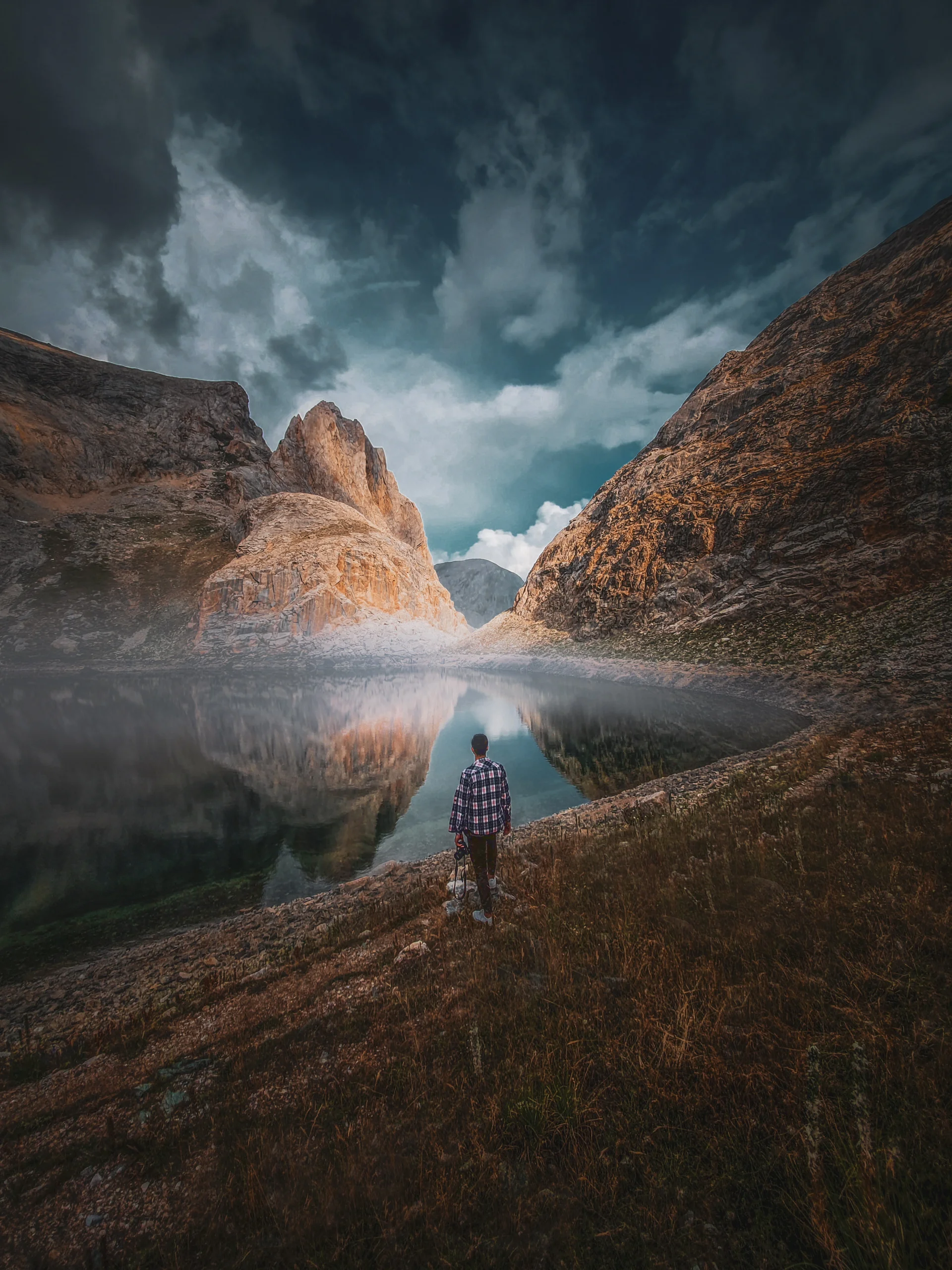 Man Gazing Mountain Lake. Nature wallpaper. 3456×4608px. Free download for personal use.