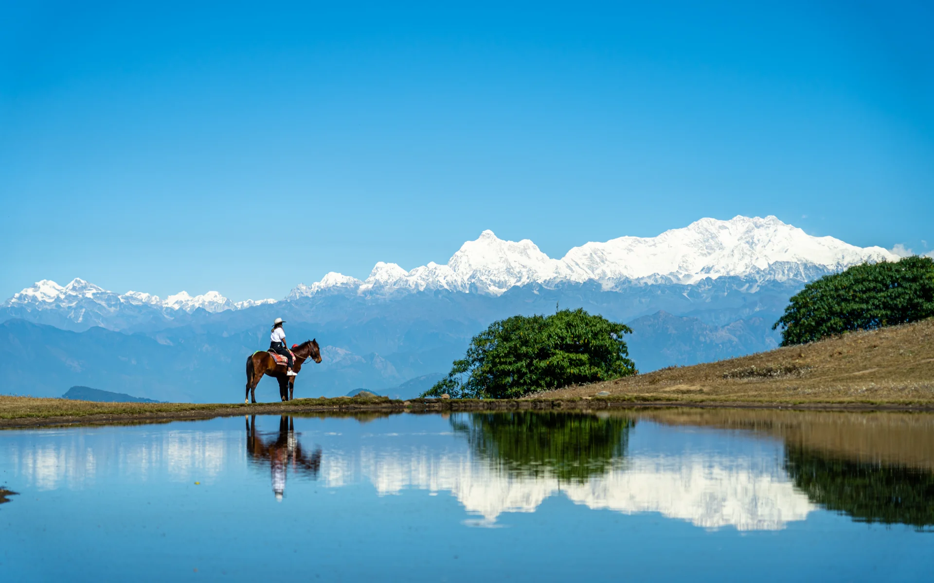 Man Riding Horse Front Mountain With Snow Mountains Background. Nature wallpaper. 6000×3750px. Free download for personal …