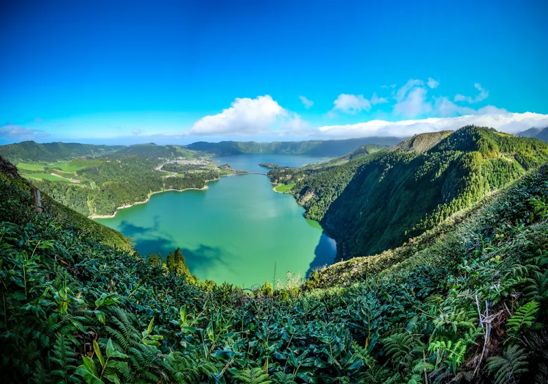 Mesmerizing View Lake Surrounded By Mountains Covered Green Blue Sky