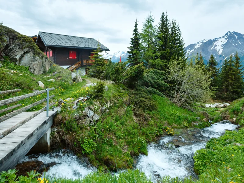 Mountain Bettmeralp Village Summer Cloudy View With Small Brook Switzerland