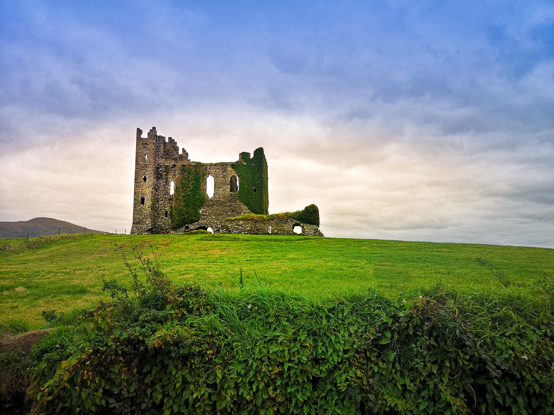 Old Ruin Building Field Against Sky. Nature wallpaper. 3648×2736px. Free download for personal use.