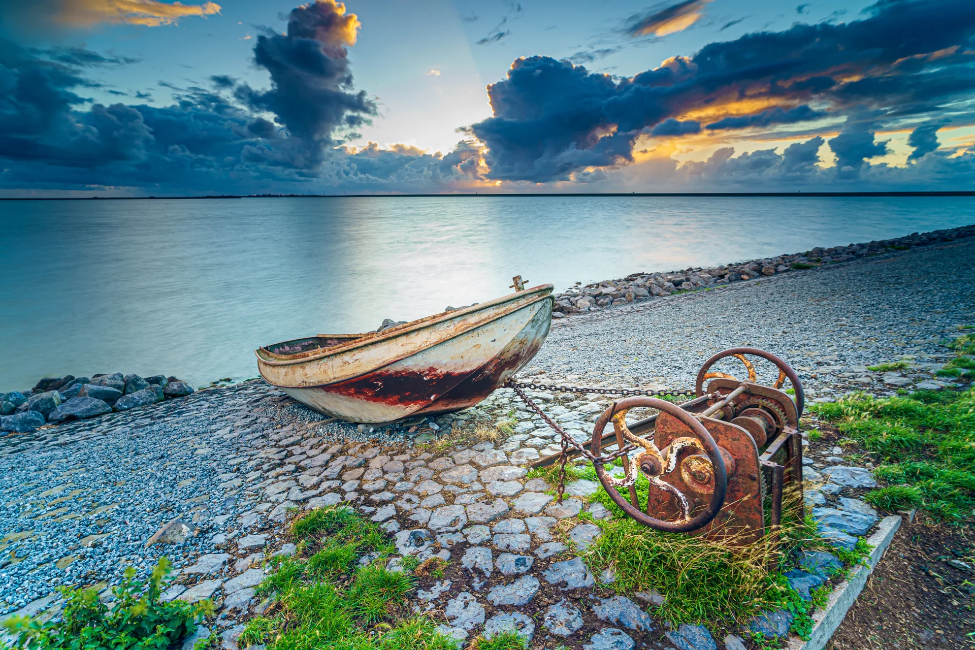 Old Rusty Fishing Boat Slope Along Shore Lake. Nature wallpaper. 5620×3747px. Free download for personal use.