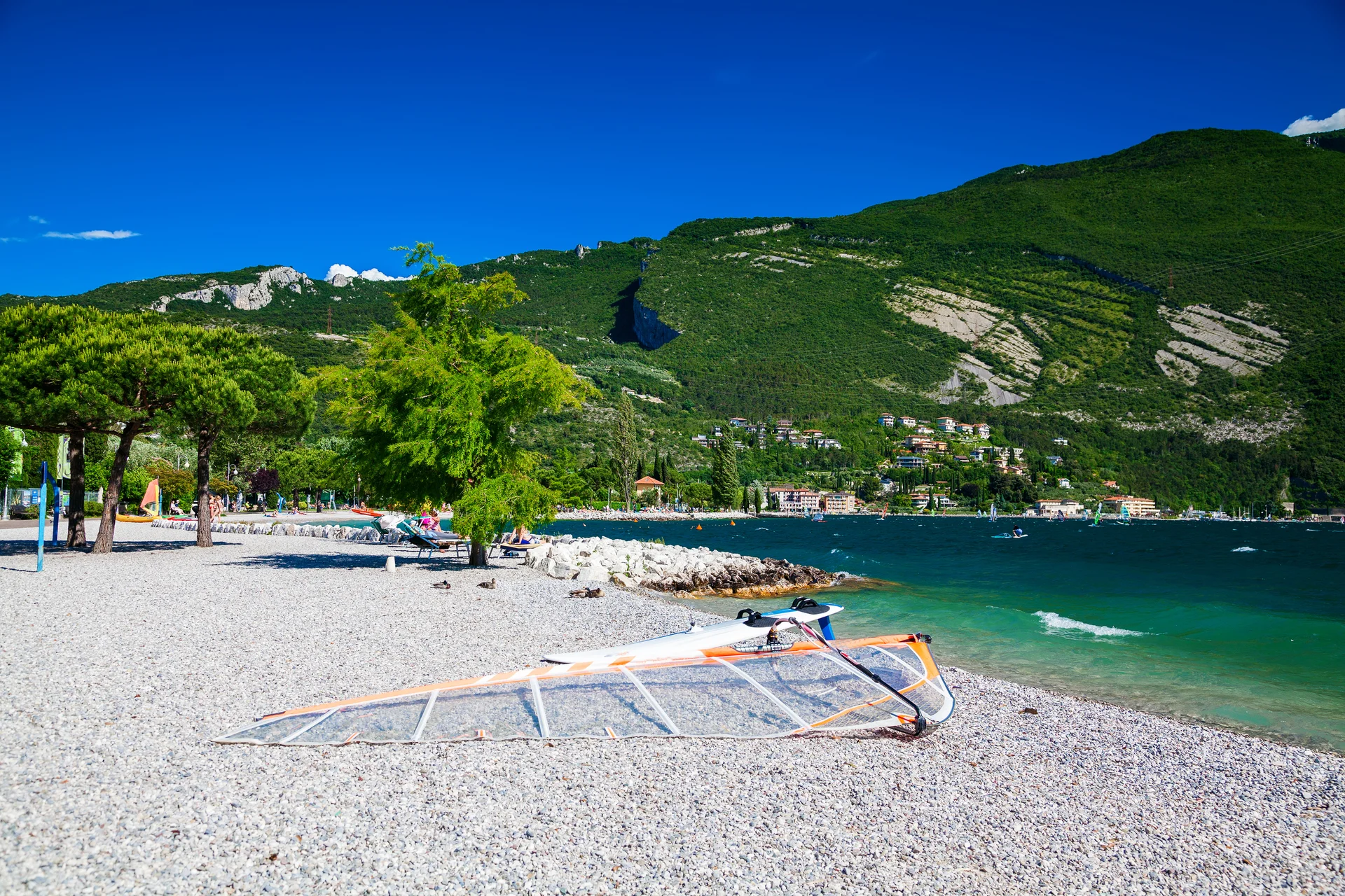 Pebble Beach Small Village Torbole Garda Lake Trentino Italy. Nature wallpaper. 4616×3077px. Free download for personal use.