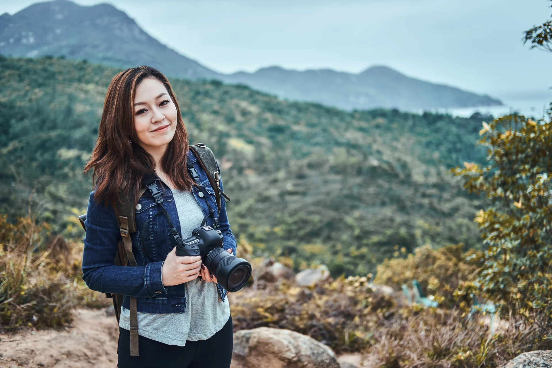 Portrait Young Smiling Chinese Woman With Photo Camera Hands She Enjoy Beautiful Sights Nature. Nature wallpaper. 6240×416…