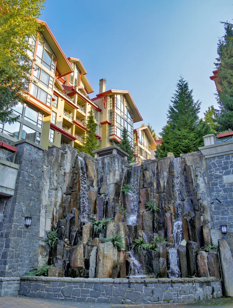 Residential Block With Decorative Waterfall Sunset Time Whistler