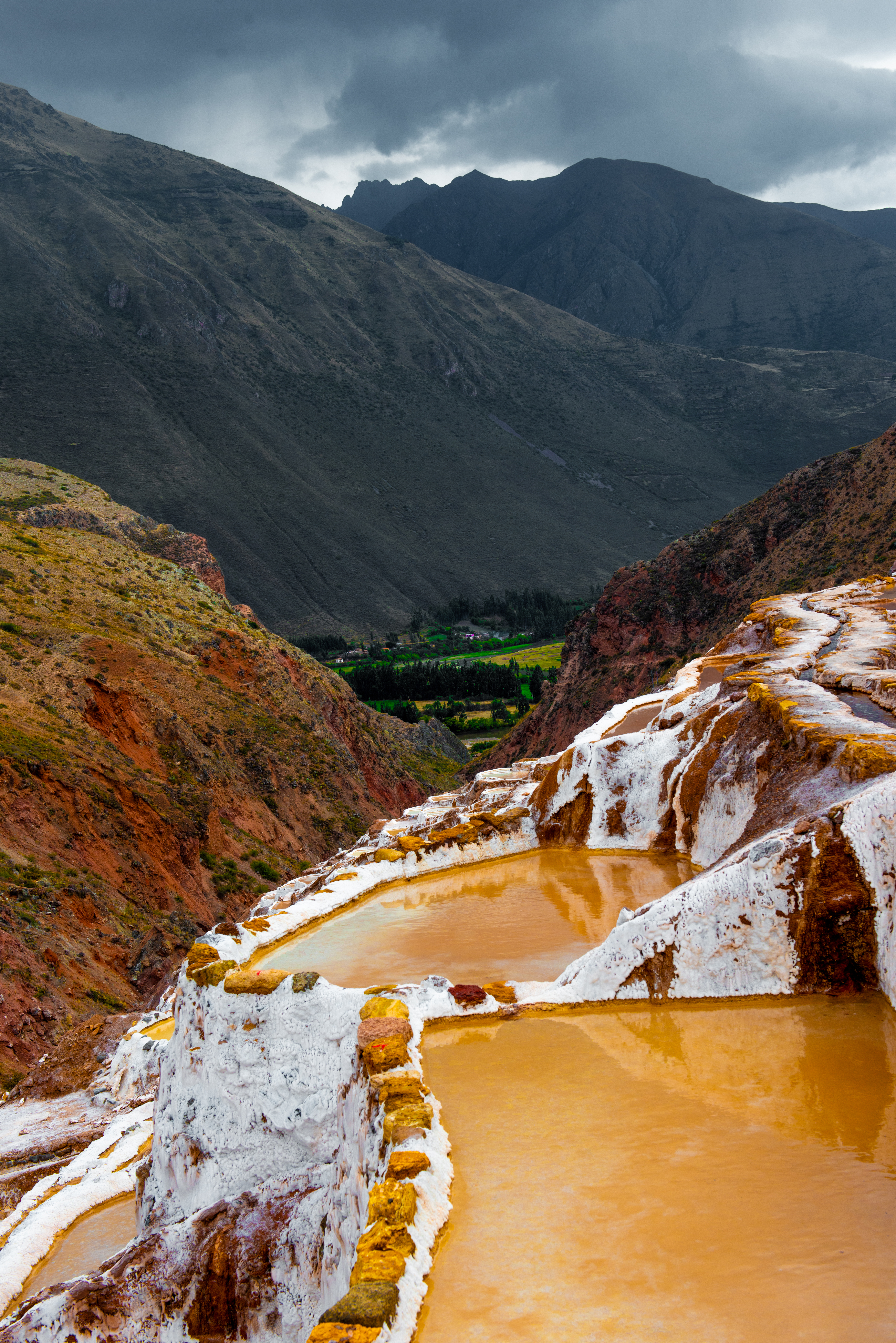 Salt Terraces Maras Peru With Mountain Views Vertical Photo