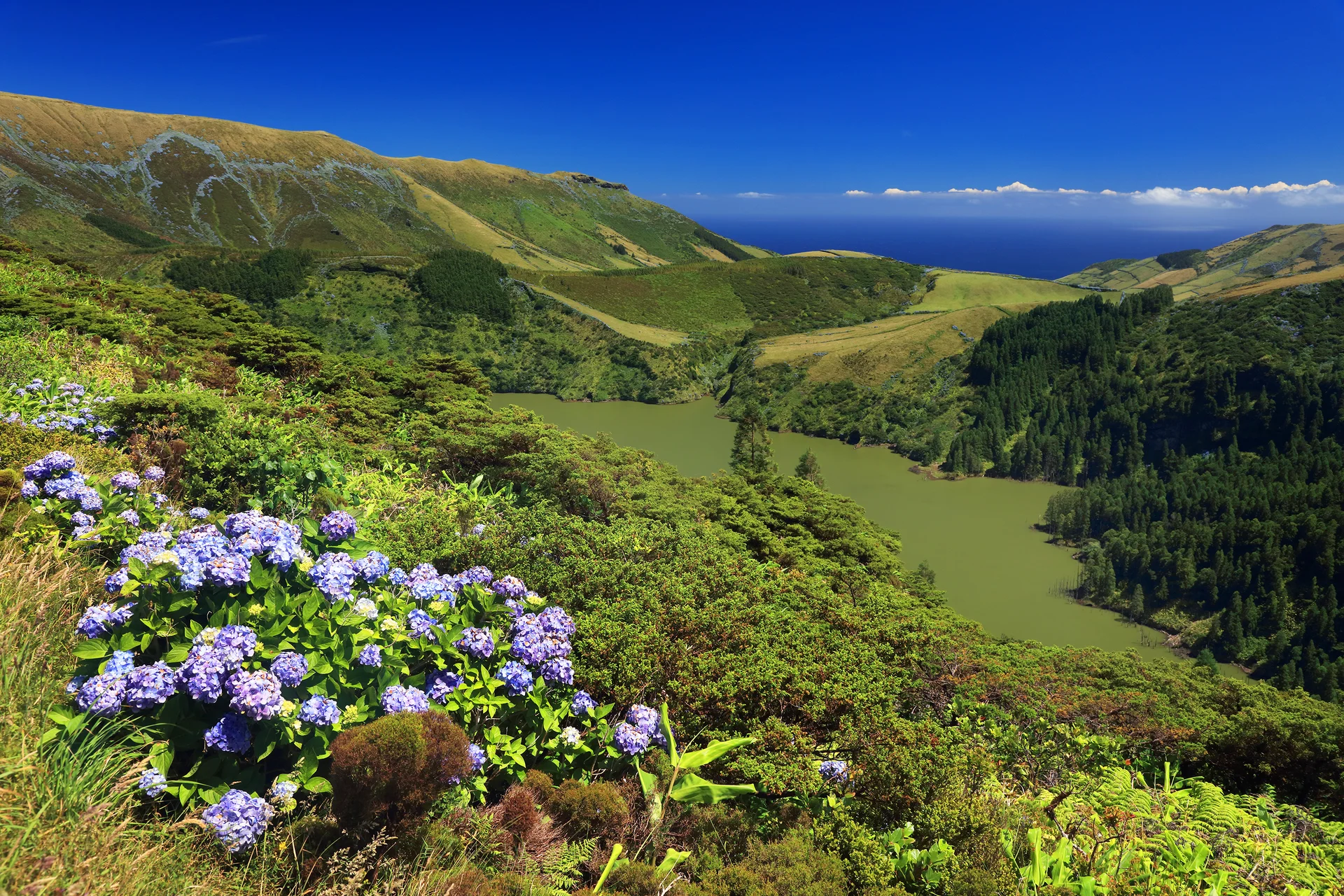 Scenic View Mountains Against Blue Sky. Nature wallpaper. 3000×2000px. Free download for personal use.