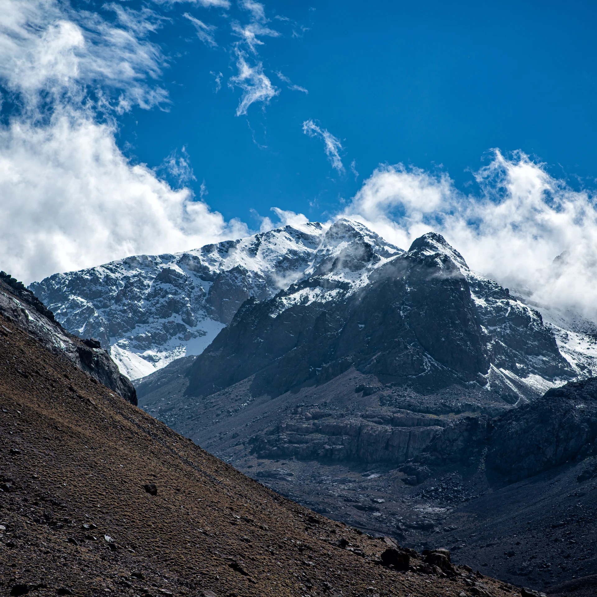 Scenic View Snowcapped Mountains Against Blue Sky. Nature wallpaper. 4912×4912px. Free download for personal use.