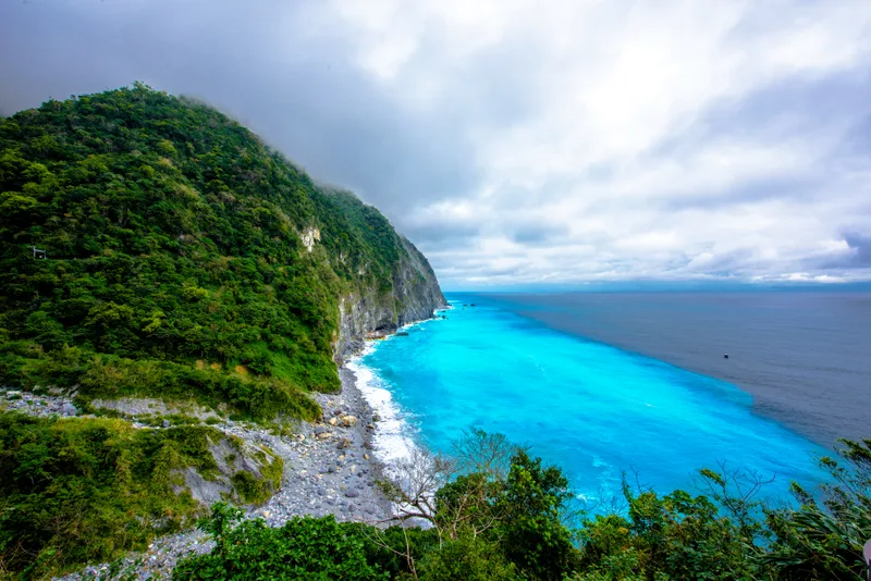 Scenic View Tree Mountain Sea Against Cloudy Sky