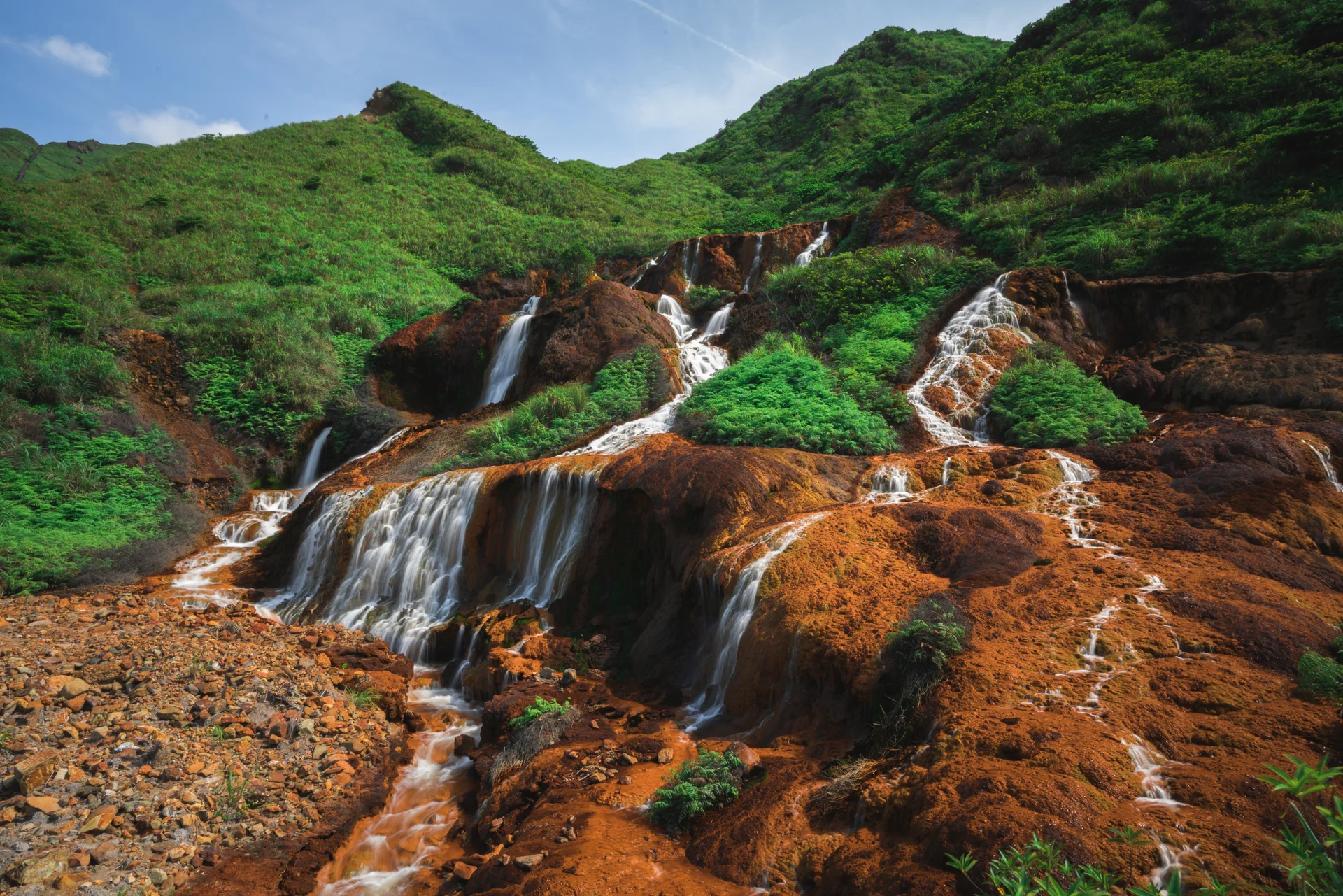 Scenic View Waterfall Rocks. Nature wallpaper. 7952×5304px. Free download for personal use.