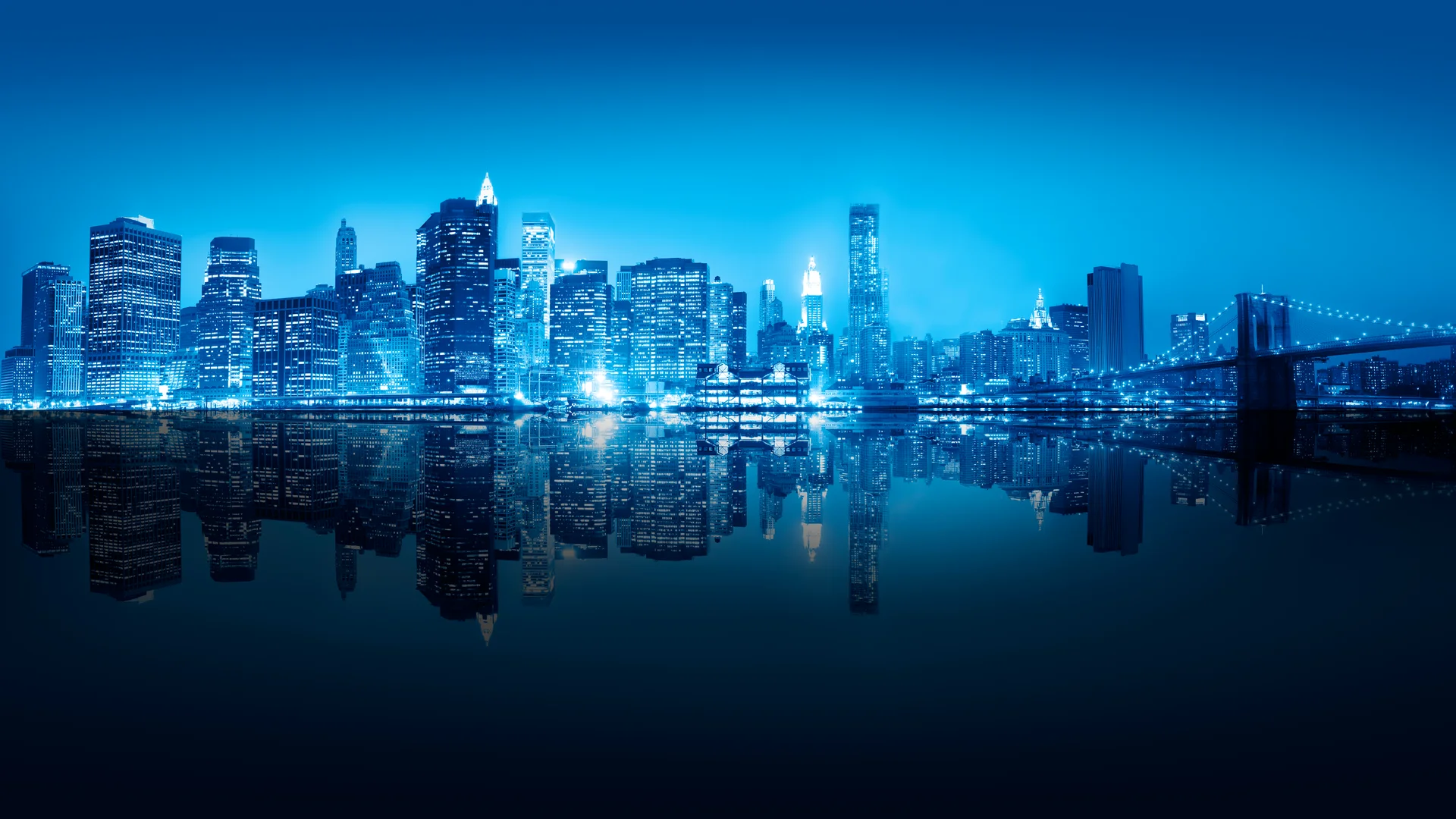 Skyscraper New York City Night. Dark wallpaper. 7680×4320px. Free download for personal use.
