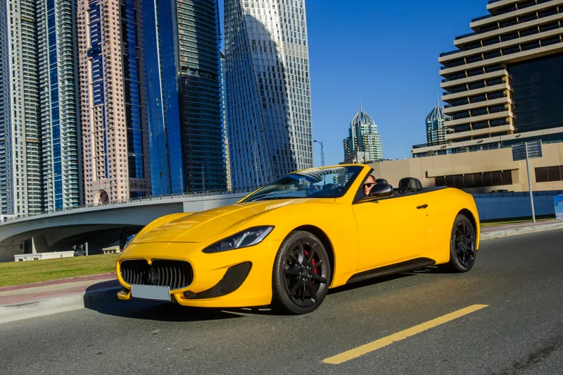 Successful Yang Businessman Yellow Cabrio Car