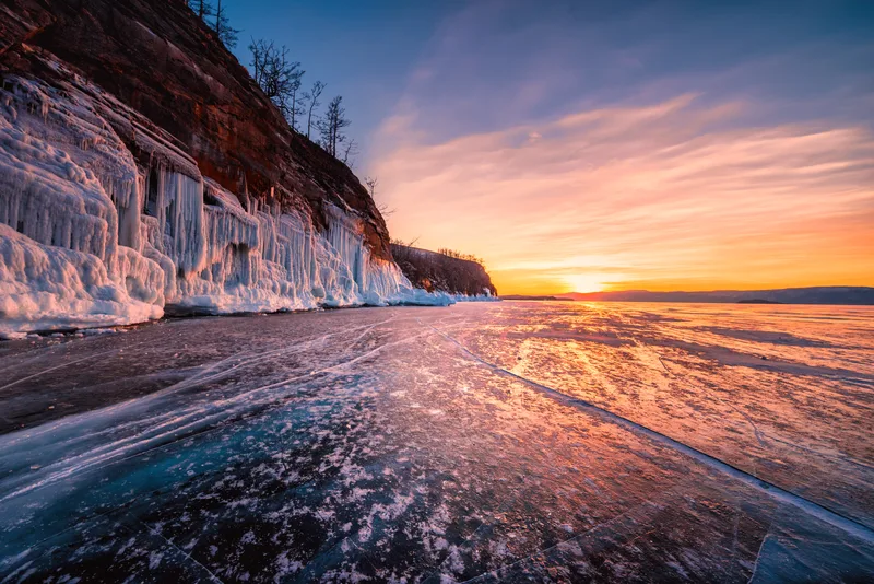 Sunset Sky With Natural Breaking Ice Frozen Water Lake Baikal Siberia Russia