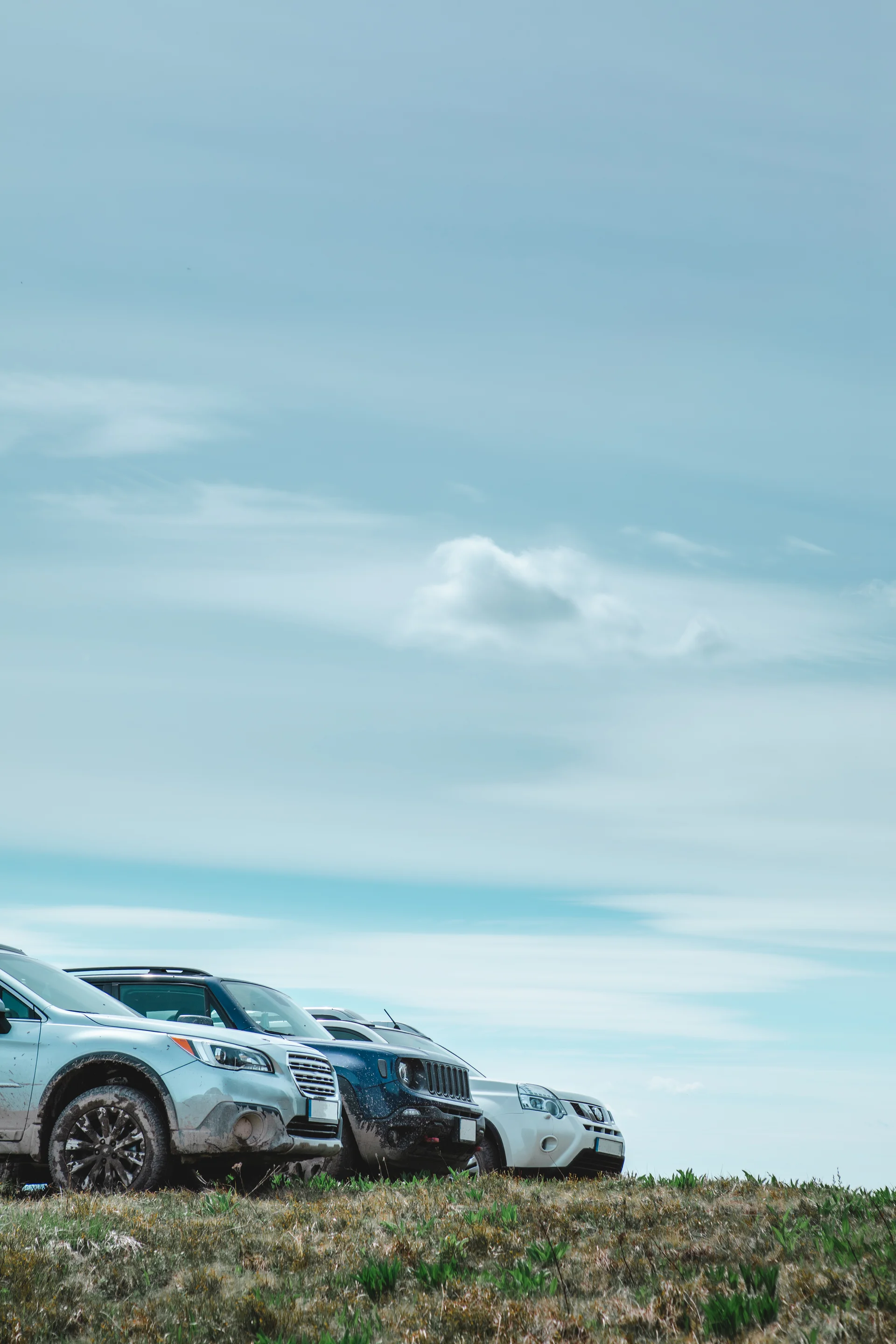 Three Suv Cars Mountains Peak Copy Space Summer Time. Cars wallpaper. 4480×6720px. Free download for personal use.