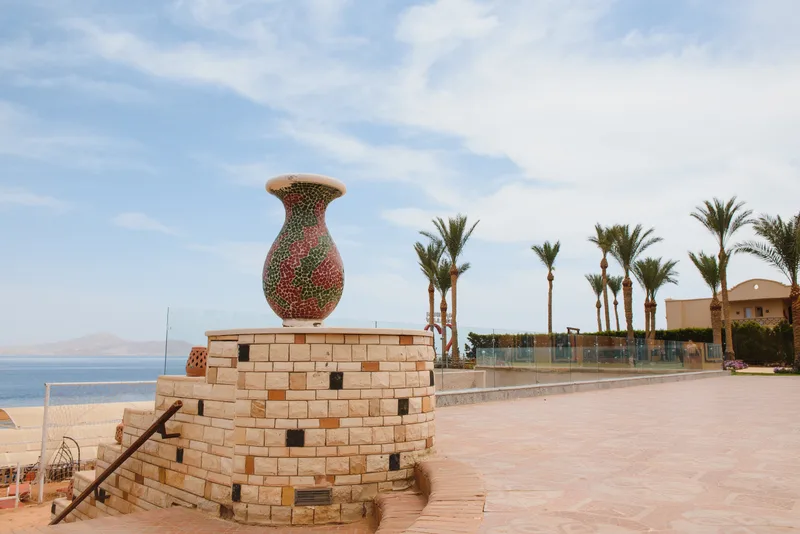 Tropical Beach Resort With Lounge Chairs Umbrellas