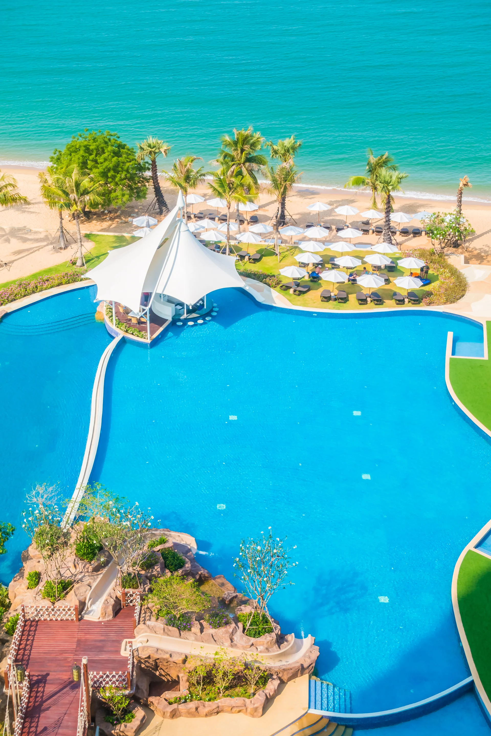 Umbrella Chair Around Swimming Pool. Uncategorized wallpaper. 3648×5472px. Free download for personal use.